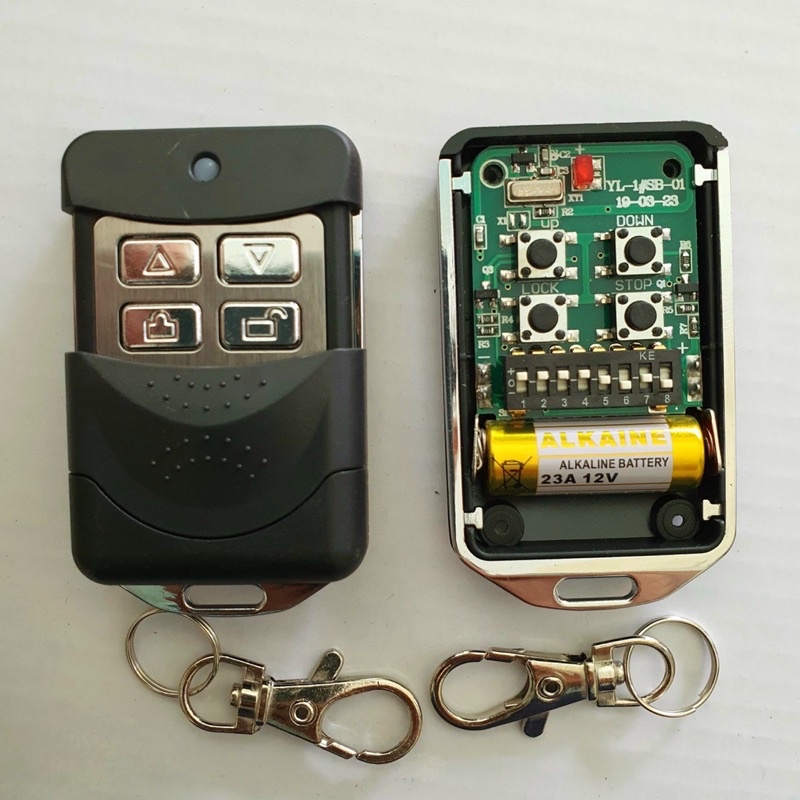 Remote điều khiển cửa cuốn 8 mã gạt tần số 433