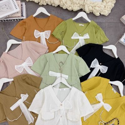 Áo sơ mi cổ v điểm nơ trắng viền túi ngọc