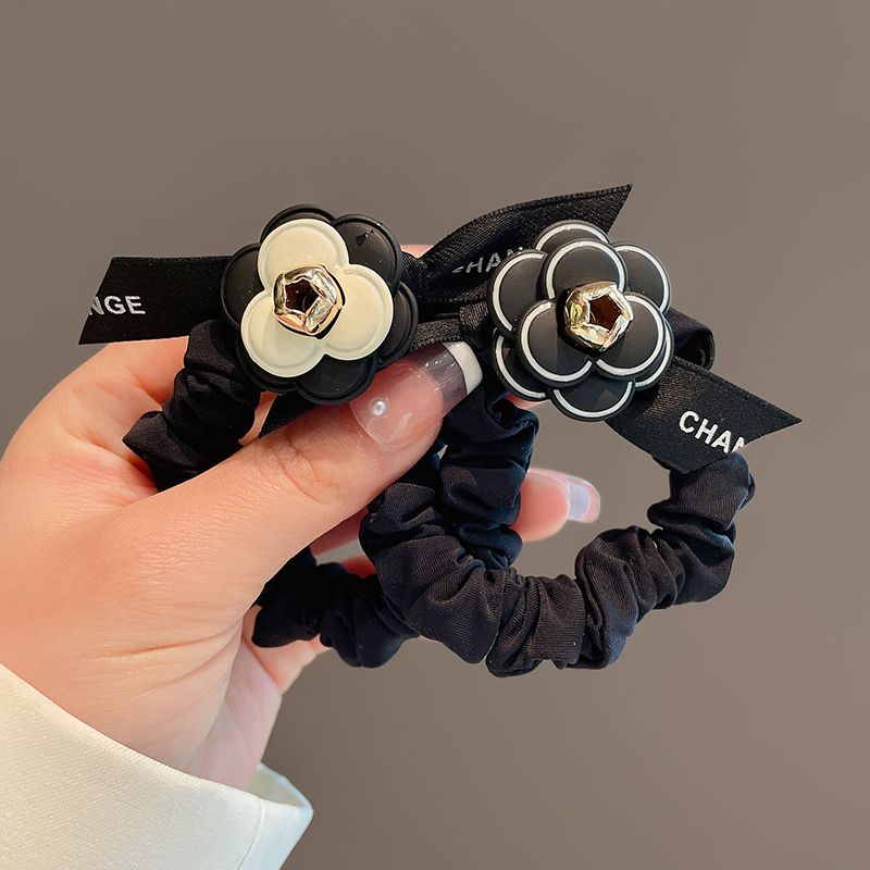 Dây Cột Tóc Cao Su Đính Pha Lê Họa Tiết Hoa Chanel Đơn Giản Dành Cho Nữ