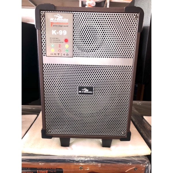loa kéo KIOMIC K-99 thùng gỗ ốp da cao cấp ,được thiết kế bass 20 ,2 đường tếng , chức năng blutooth , usb , mp3, mp4,..