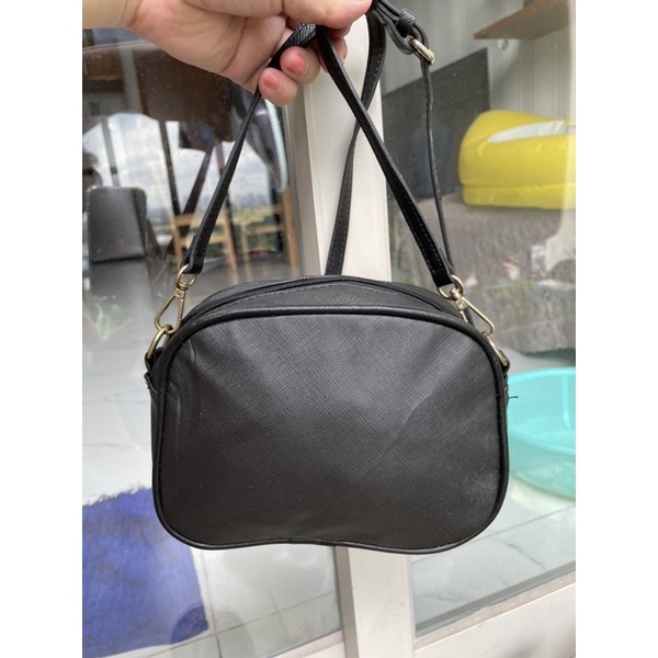 Túi si đeo chéo đồng giá