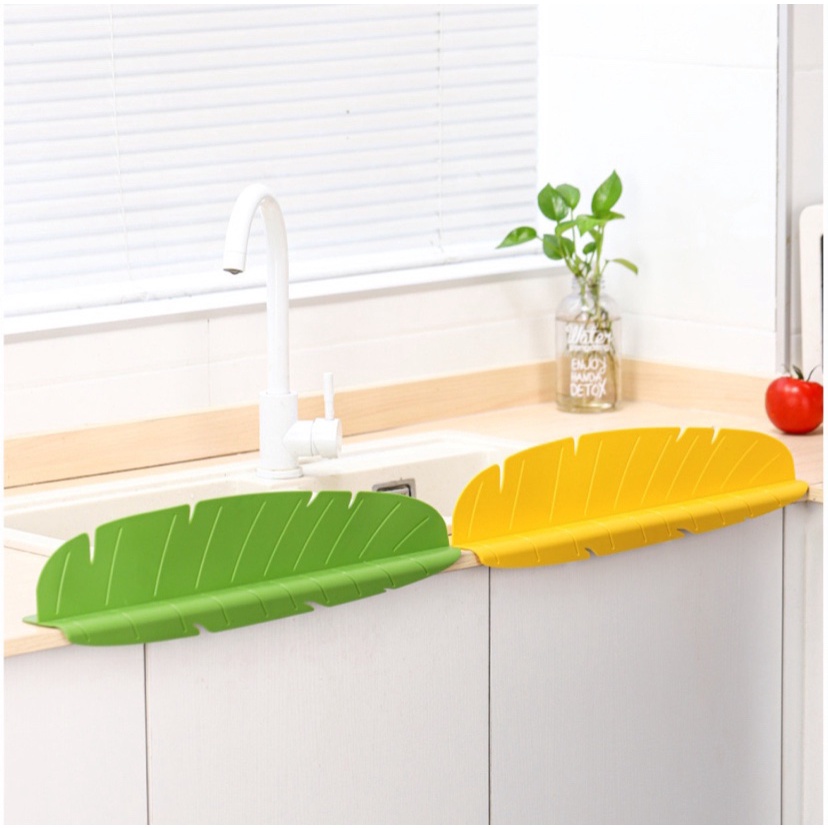 Tắm chắn nước văng gắn bồn rửa chén hình chiếc lá chuối
