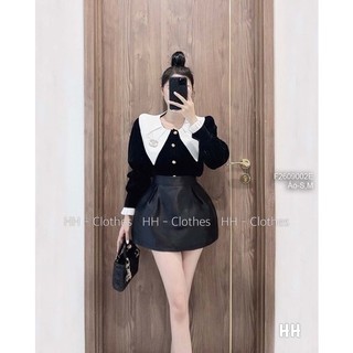 Áo nhung đen đính nút giữa phối cổ bèo trắng vạt nhọ