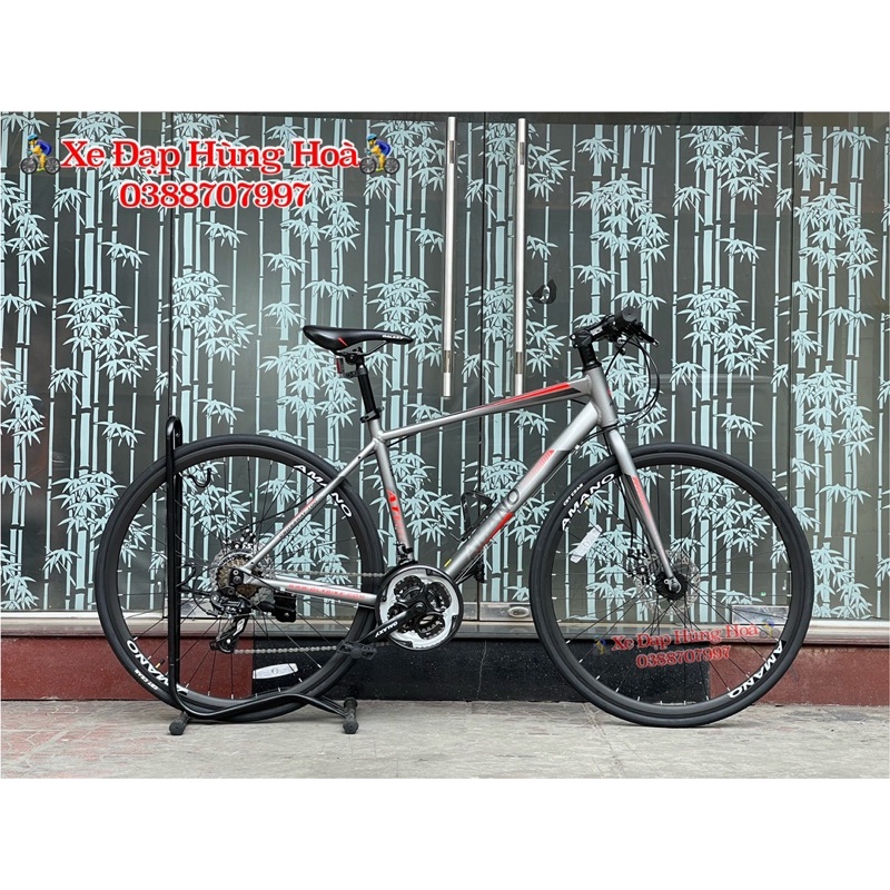 Xe Đạp Amano AT100-2023 Khung Nhôm Tặng Combo 5 PK