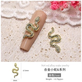 Charm rắn trang trí móng