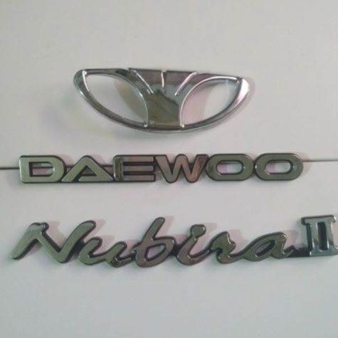 Lộ gô/ logo chữ nổi dán đuôi xe Nubira - Phu tùng XE CỎ