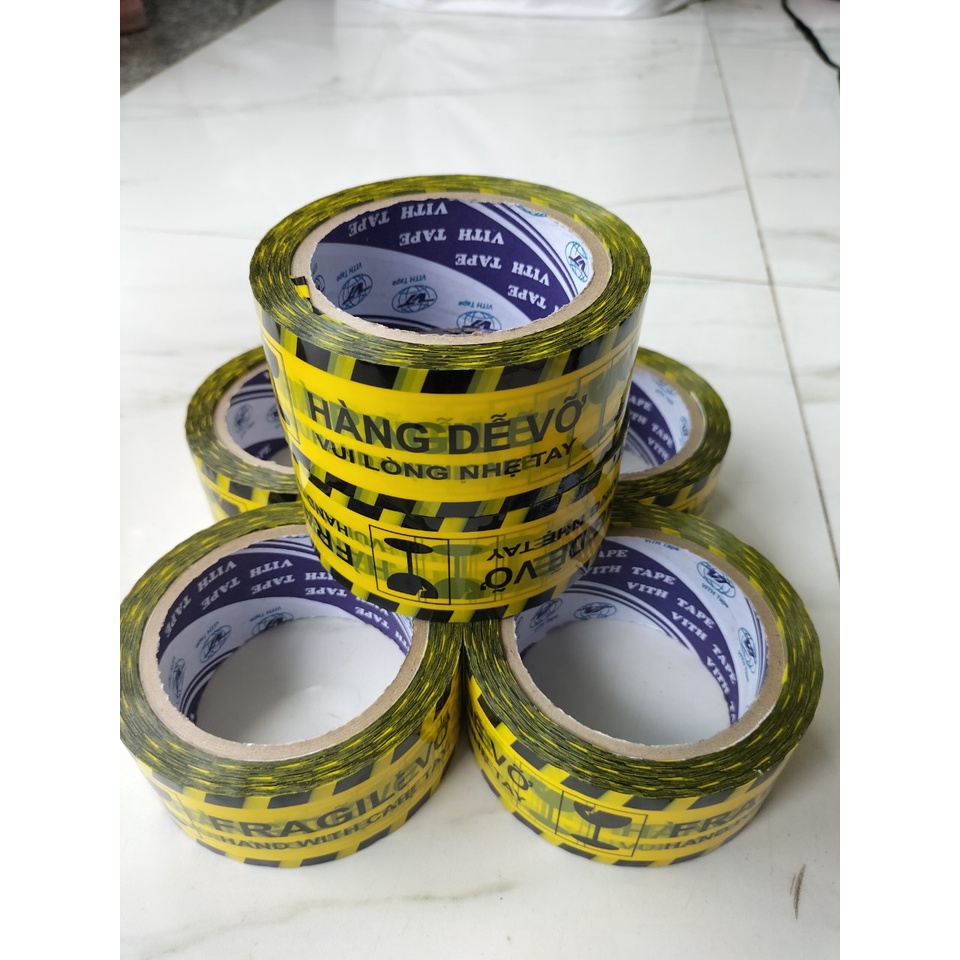 Băng keo 100Yard "HÀNG DỄ VỠ" nặng 1kg lõi giấy 3mm giá rẻ có sẵn