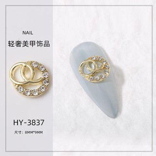 Charm đính móng mã 38