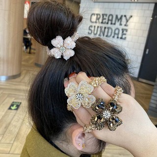 Phiên bản Hàn Quốc cỏ bốn lá pha lê đầu dây tính khí lưới đỏ buộc tóc ruột già vòng tóc gấu tóc dây phụ kiện tóc