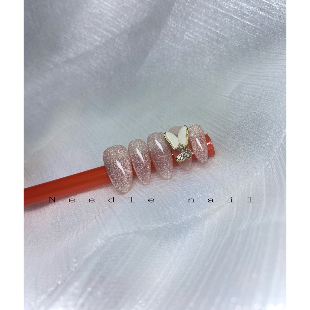 Móng giả thiết kế mắt mèo kim cương đính charm bướm