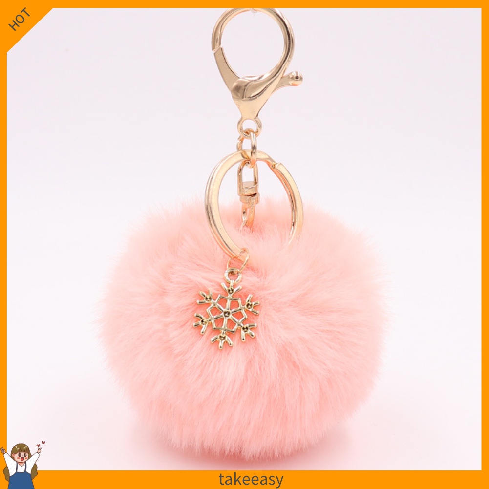 Móc khóa hình bông tuyết đính banh xù dễ thương