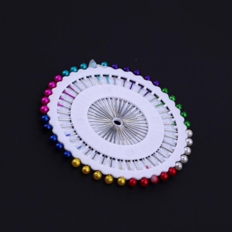 Ghim cố định vải khi máy.