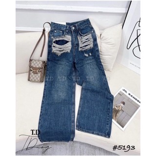 Quần jeans suông rách túi