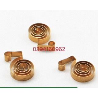 Lò xo đồng máy cắt vải đứng