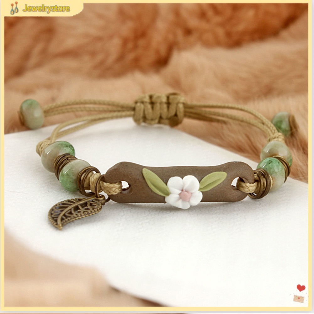 Vòng tay dây bện phối mặt charm gốm hình hoa và lá thời trang cho nữ