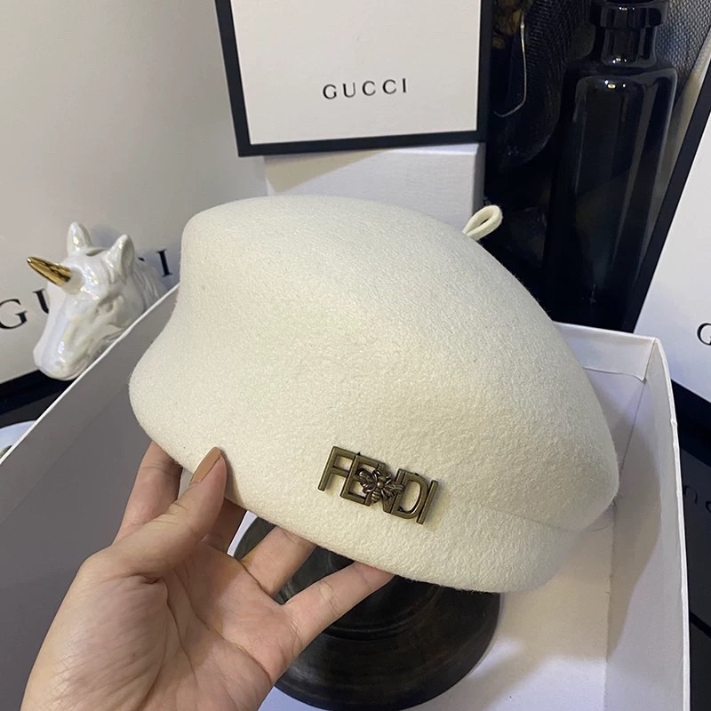 Mũ nồi dạ fendi mai phương bùi