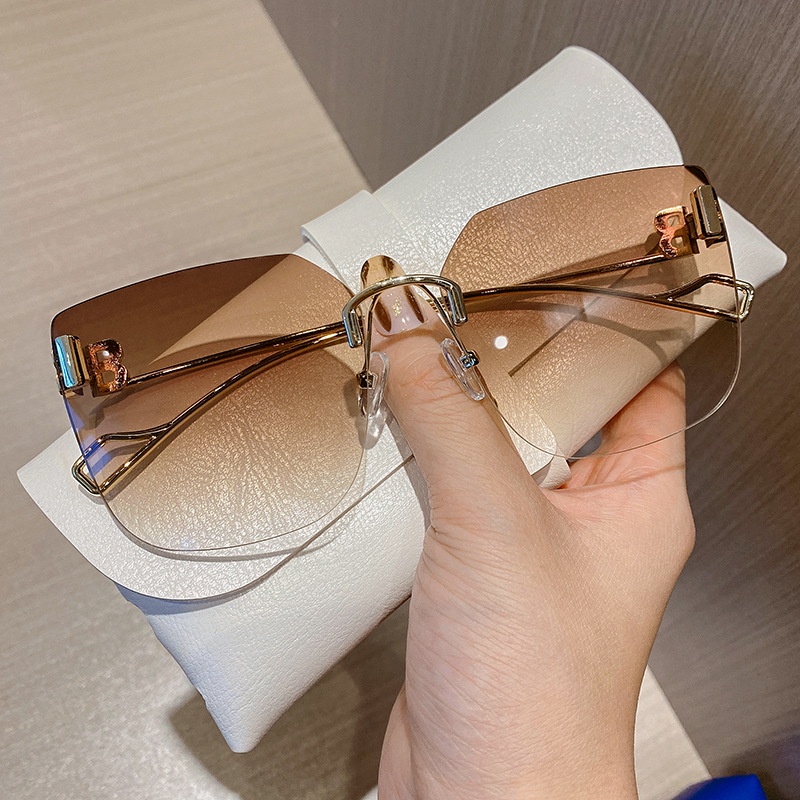 Kính Râm Nữ Oversized Không Gọng Kim Loại Chống Tia UV Mẫu Mới