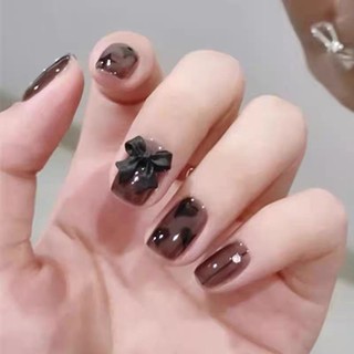 nailbox ,10 móng úp thiết kế , đính nơ đen.