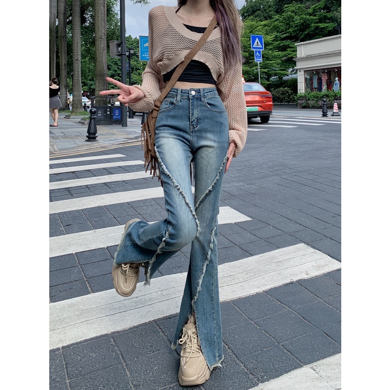 Quần Jean Nữ Ống Loe Xẻ Tà Mới