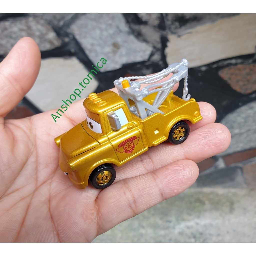 Xe mô hình tomica Nhật Bản - Cars Mater màu vàng không hộp