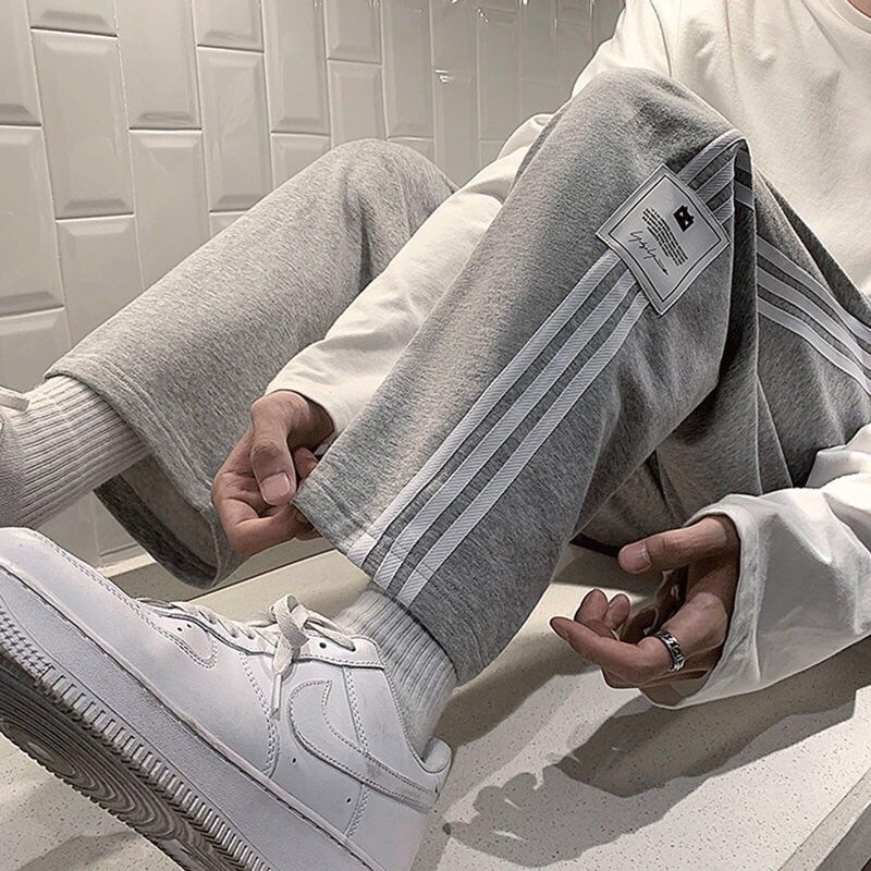 Quần Dài Thể Thao Dáng Rộng Họa Tiết Kẻ Sọc Thời Trang Xuân Thu Phong Cách Đường Phố Mới Cho Nam