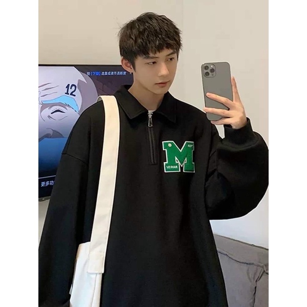 Áo polo chữ M khoá thêu đáp KA899