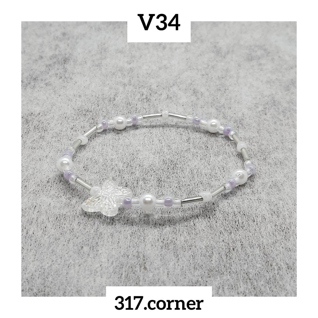 Vòng tay hạt cườm + mặt bướm hologram - V34 - 317.corner