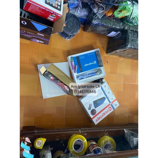 Âm ly Karaoke kèm míc cắm rắc Zin trên ô tô