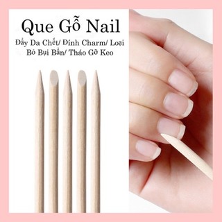 Que đẩy da, cây chấm khóe móng, là mép móng