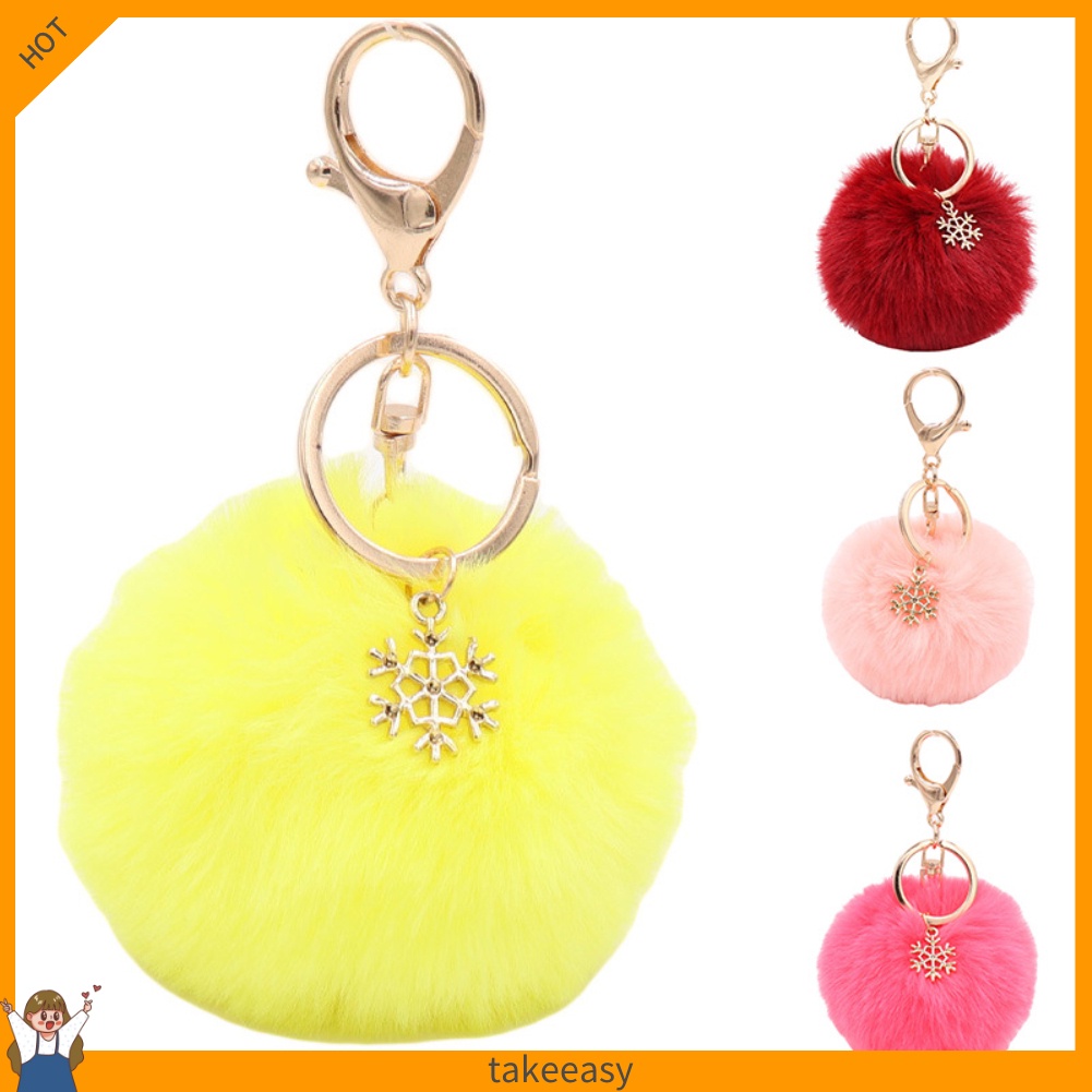 Móc khóa hình bông tuyết đính banh xù dễ thương
