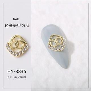Charm đính móng mã 38