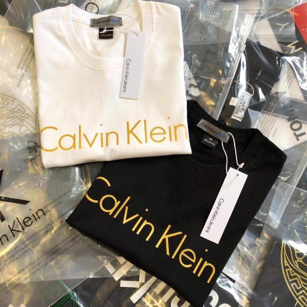 Áo Thun Ngắn Tay In Chữ Calvin1N Kèm Thẻ Thời Trang Cho Nam Nữ