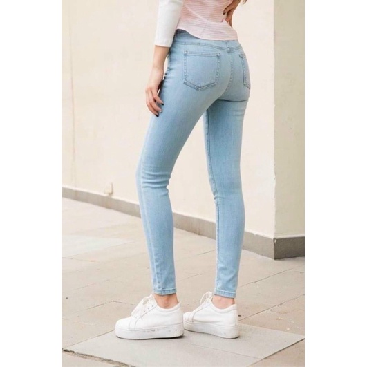 Quần jeans rách ngang gối dáng skinny dài