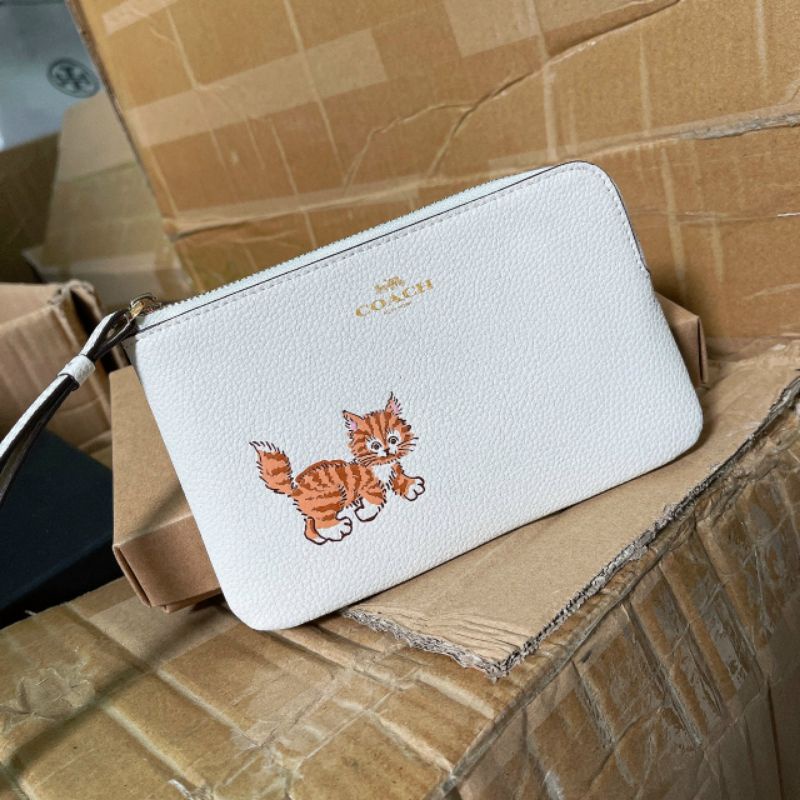 Ví coach đeo cổ tay siêu cưng