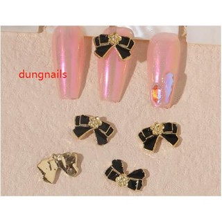charm nơ đen trắng nail mã mới
