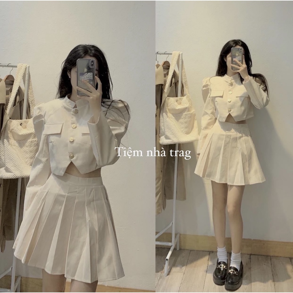 Sét váy xếp ly tuyết mưa Hàng siêu xịn, mặc lên cực sang luôn ạ. Thiết kế lên chuẩn mẫu. Áo đóng cúc đồng. Chân váy có q