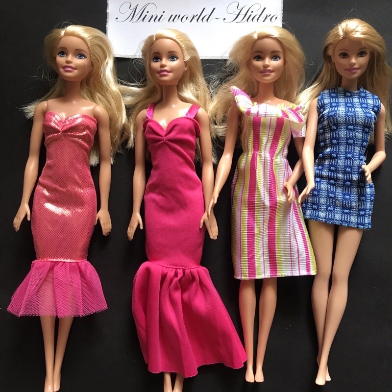 Búp bê Barbie chính hãng tặng váy giày thanh lí
