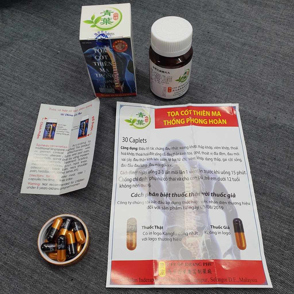 Tọa cốt thiên ma thông phong hoàn Chai nhựa Nắp trắng, viên đen có chữ KANGFU  Lọ 30 viên Nang