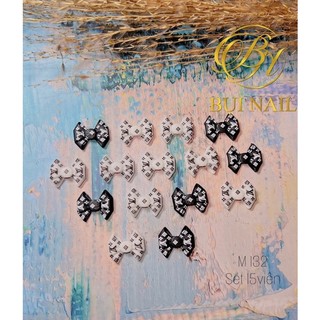 Charm nơ trắng đen lv set 15viên m132