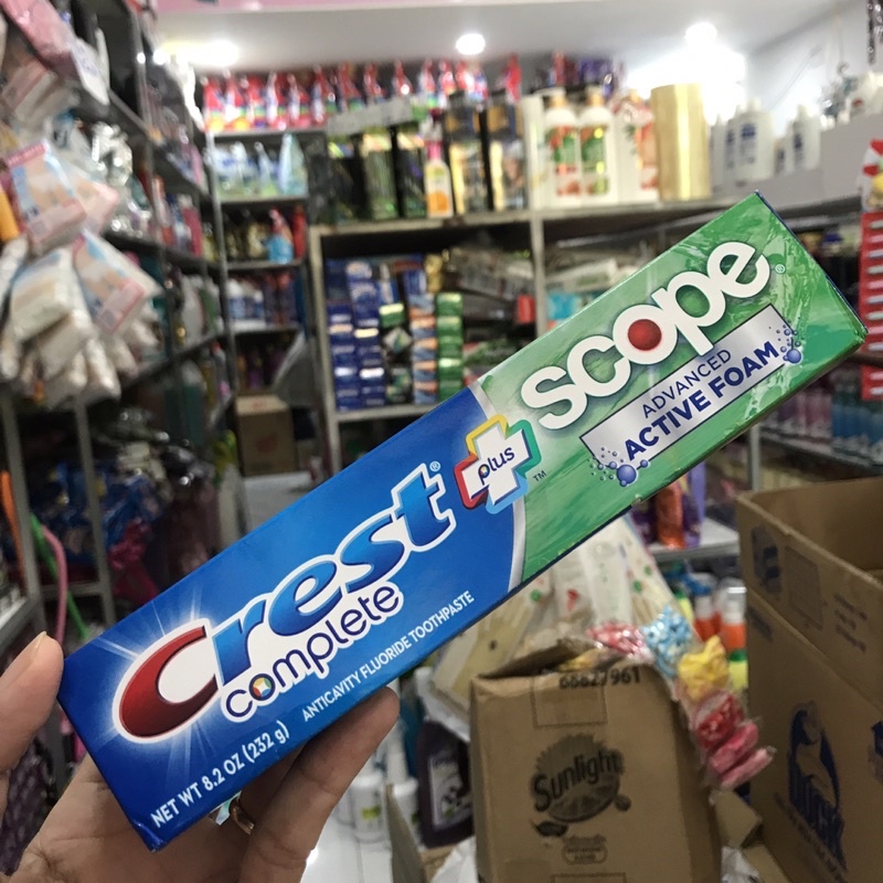 Kem đánh răng Crest Complete Extra Whitening Scope Advanced Freshness 232g.
