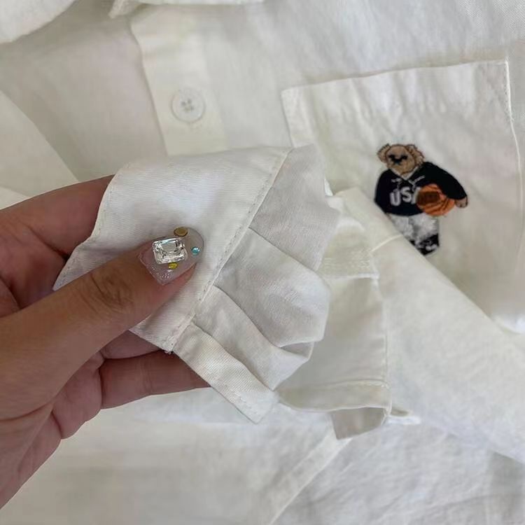 Nhật bản hàn quốc quần áo trẻ em bé trai mùa xuân thu áo sơ mi cotton trẻ em áo sơ mi trắng phiên bản hàn quốc gấu thêu dài tay áo sơ mi kẻ sọc