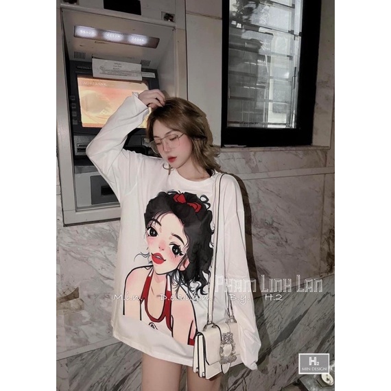 Áo phông dài tay in hình cô gái tóc cột nơ