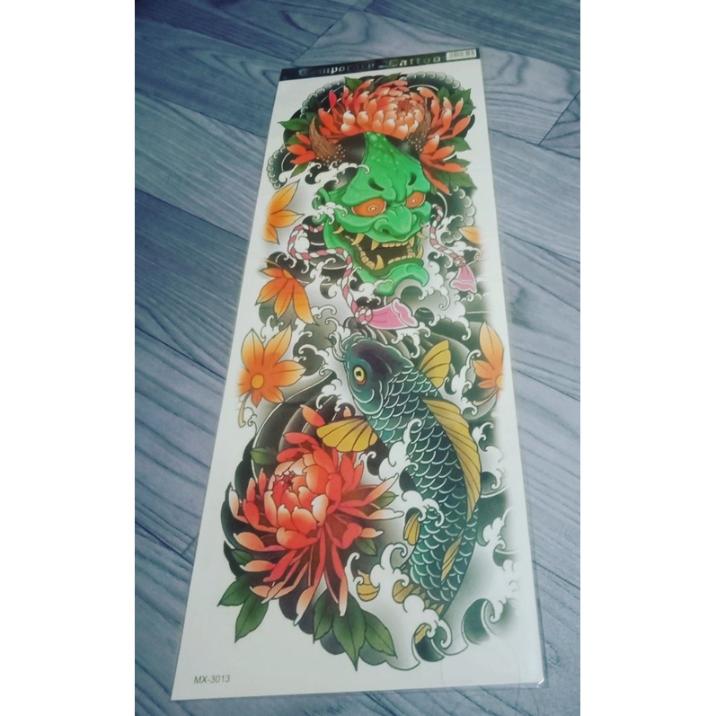 Hình xăm dán mặt quỷ xanh da cam full tay nửa lưng