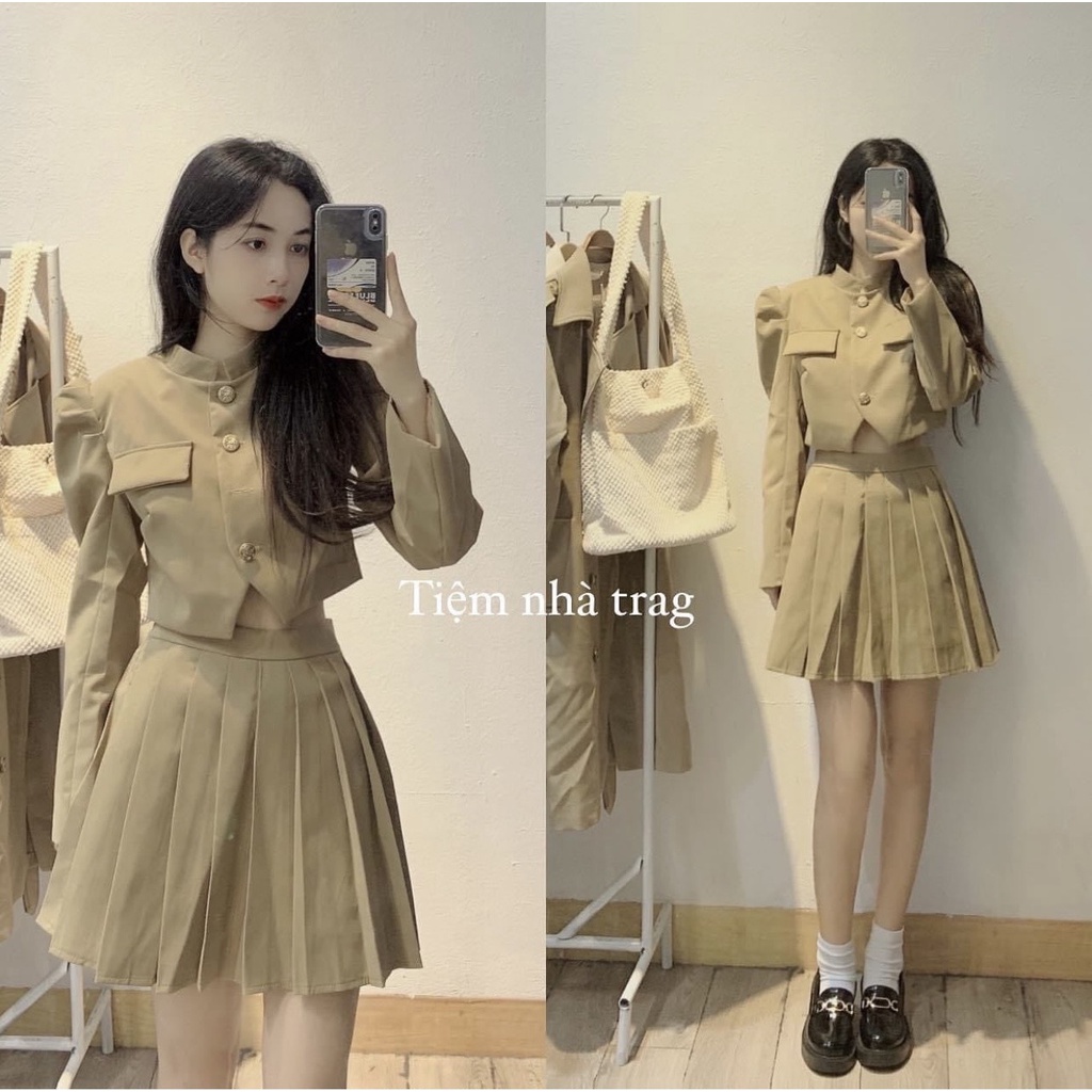 Sét váy xếp ly tuyết mưa Hàng siêu xịn, mặc lên cực sang luôn ạ. Thiết kế lên chuẩn mẫu. Áo đóng cúc đồng. Chân váy có q