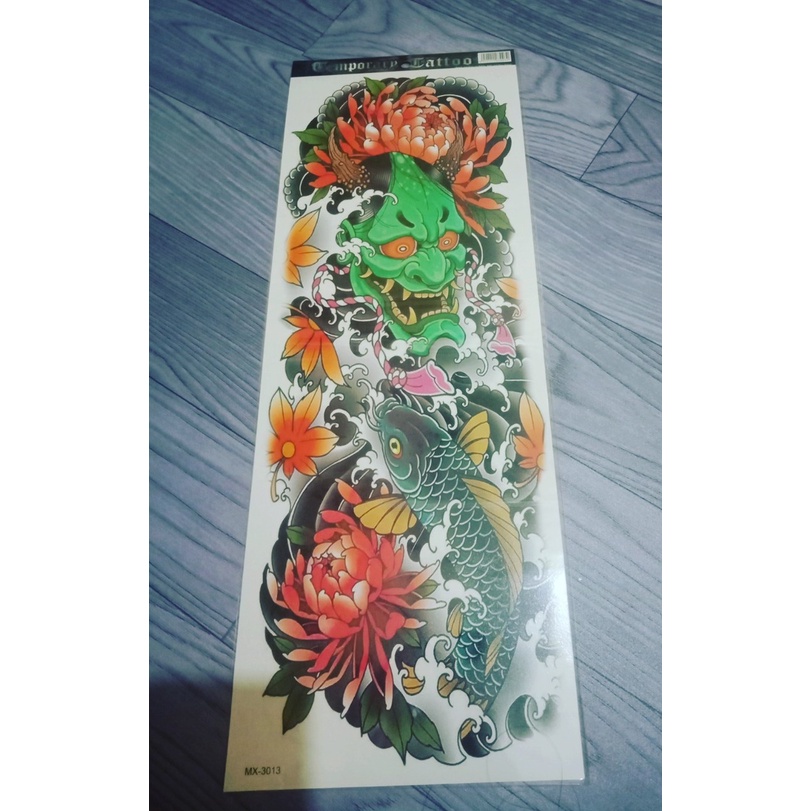 Hình xăm dán mặt quỷ xanh da cam full tay nửa lưng