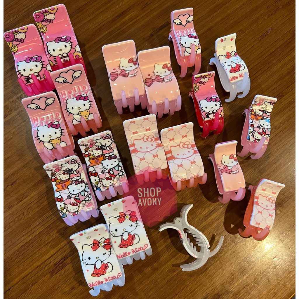 Kẹp tóc, bấu tóc càng cua 3 - 5 răng in hoạ tiết mèo kitty gam màu trắng hồng (hàng Honey)