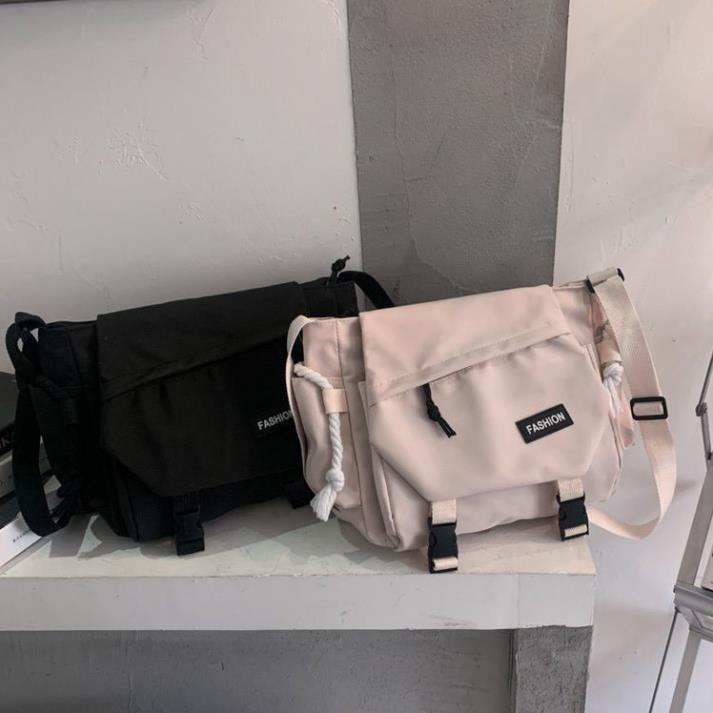 Cặp sách đeo chéo vải chống thấm khóa bấm thời trang | BigBuy360 - bigbuy360.vn