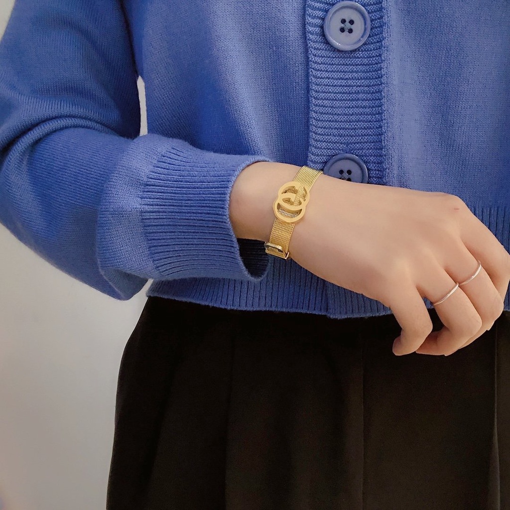 Vòng Tay Gucci Bằng Thép Titan Họa Tiết Hai Chữ GG