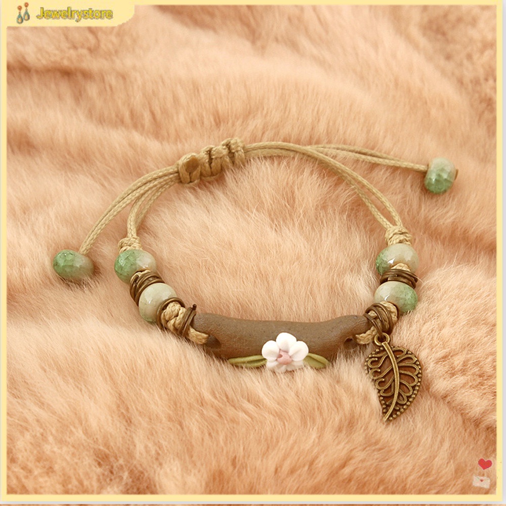 Vòng tay dây bện phối mặt charm gốm hình hoa và lá thời trang cho nữ