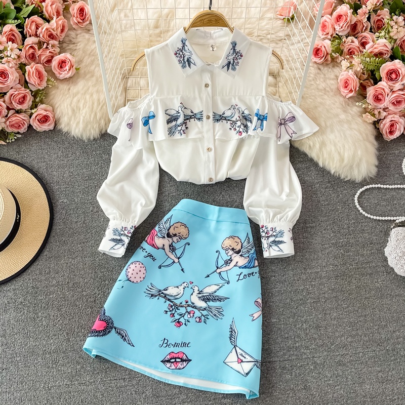 Set áo trắng khoét vai + chân váy xanh họa tiết siêu đẹp